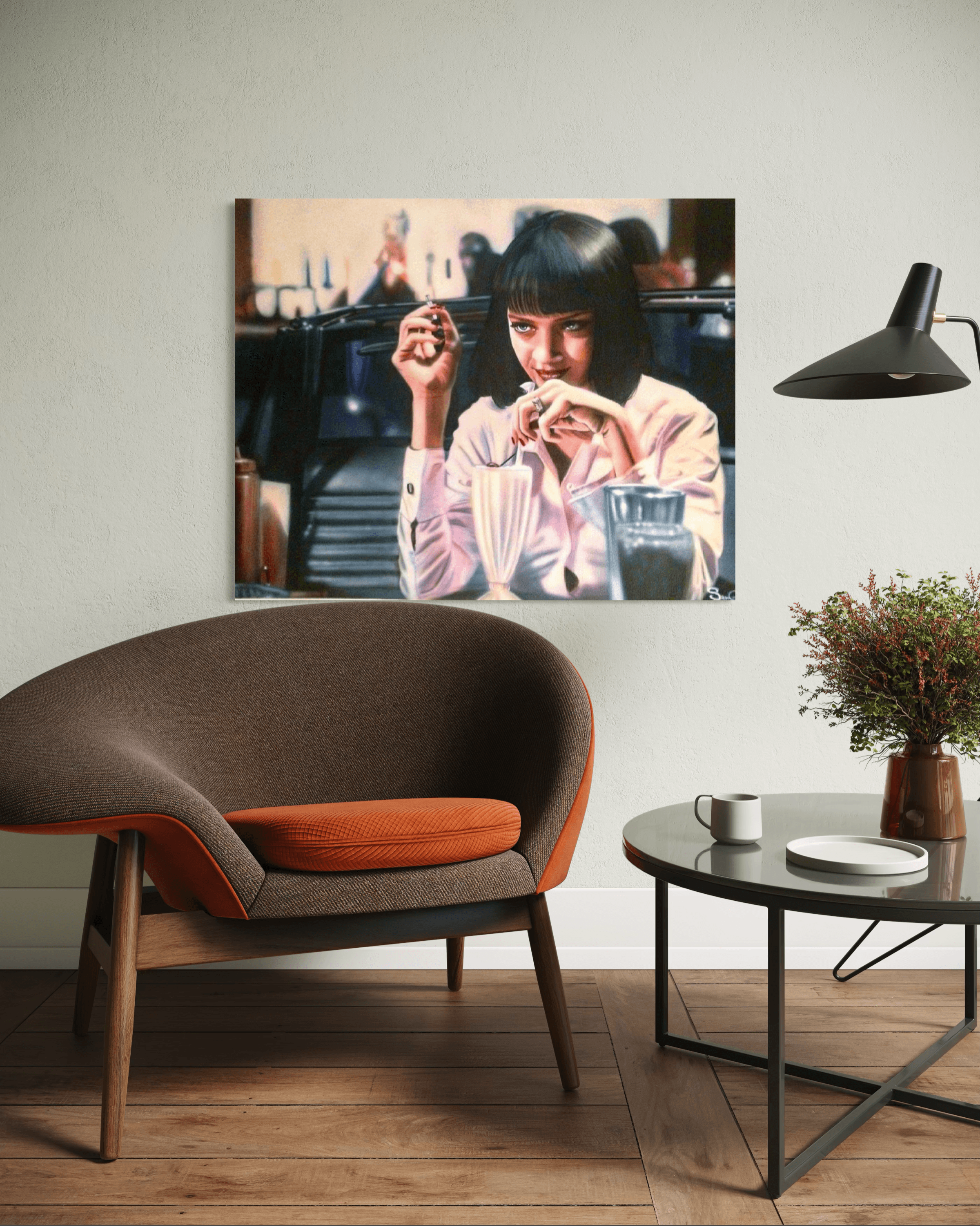 Pulp Fiction Mia Wallace wall art above a modern armchair in a minimalist living room.